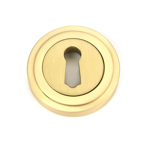 From The Anvil - Satin Brass Round Escutcheon (Art Deco) - Satin Brass  - 50873 - Choice Handles