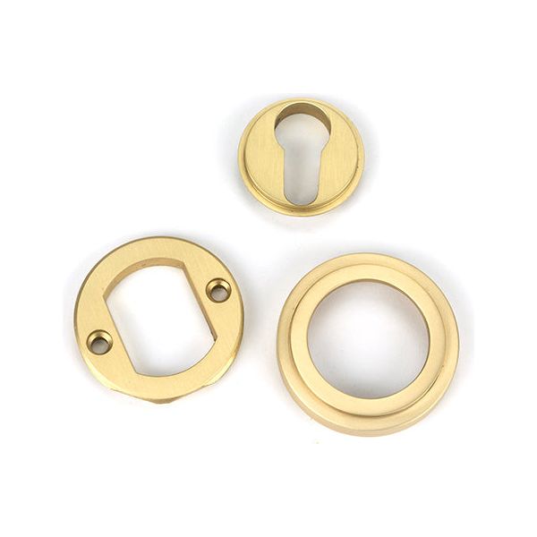 From The Anvil - Satin Brass Round Euro Escutcheon (Art Deco) - Satin Brass  - 50877 - Choice Handles