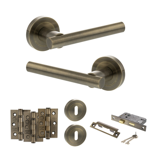 STATUS Nebraska Door Handle Pack (3 Lever Lock Set - 3" CE Sashlock, 3" Fire Rated Hinges x3) - Antique Brass - ADPS28RAB15 - Choice Handles