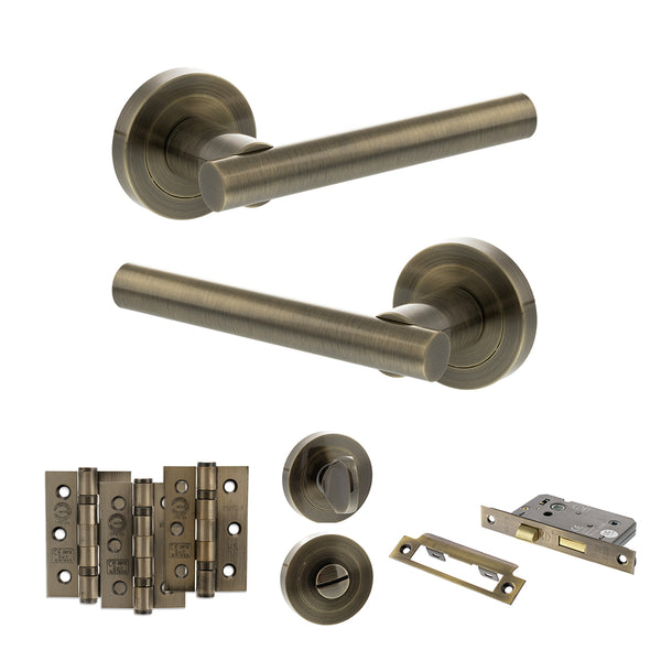STATUS Nebraska Door Handle Pack (Bathroom Set - 2.5" CE Bathroom Lock, 3" Fire Rated Hinges x3) - Antique Brass - ADPS28RAB8