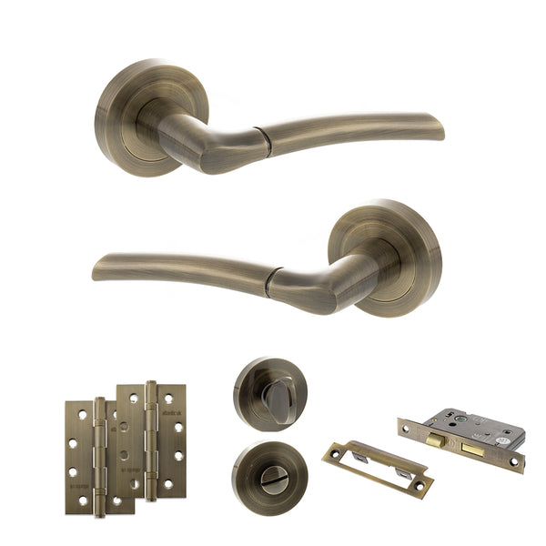 STATUS Indiana Door Handle Pack (Bathroom Set - 3" CE Bathroom Lock, 4" Slim Knuckle Hinges x2) - Antique Brass - ADPS33RAB13 - Choice Handles