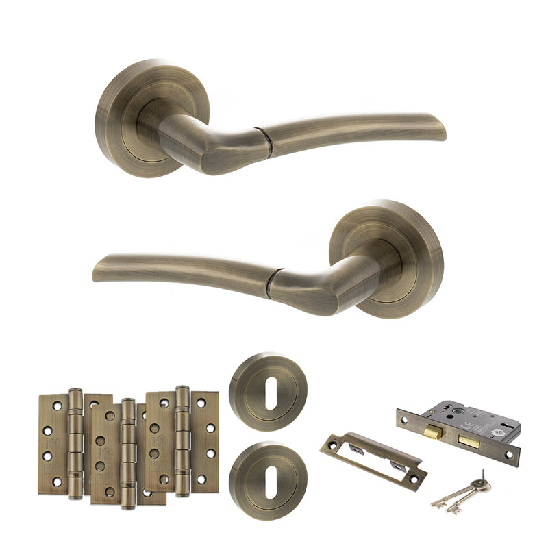 STATUS Indiana Door Handle Pack (3 Lever Lock Set - 2.5" CE Sashlock, 4" Fire Rated Hinges x3) - Antique Brass - ADPS33RAB16 - Choice Handles