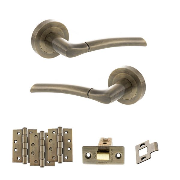 STATUS Indiana Door Handle Pack (Latch Set - 3" CE Latch, 4" Fire Rated Hinges x3) - Antique Brass - ADPS33RAB4 - Choice Handles