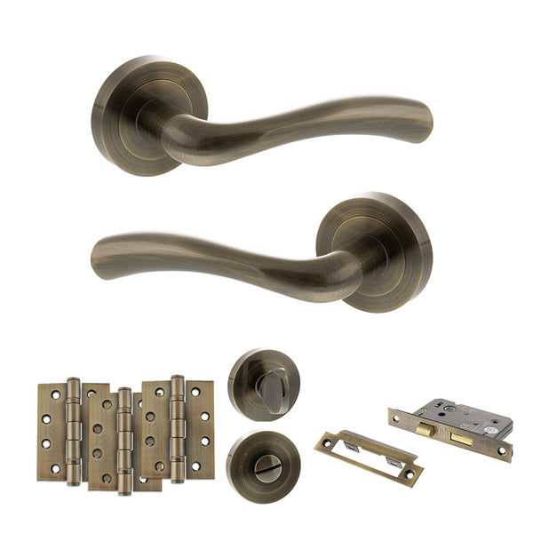 STATUS Texas Door Handle Pack (Bathroom Set - 2.5" CE Bathroom Lock, 4" Fire Rated Hinges x3) - Antique Brass - ADPS35RAB10 - Choice Handles