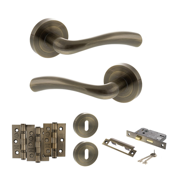 STATUS Texas Door Handle Pack (3 Lever Lock Set - 2.5" CE Sashlock, 3" Fire Rated Hinges x3) - Antique Brass - ADPS35RAB14 - Choice Handles