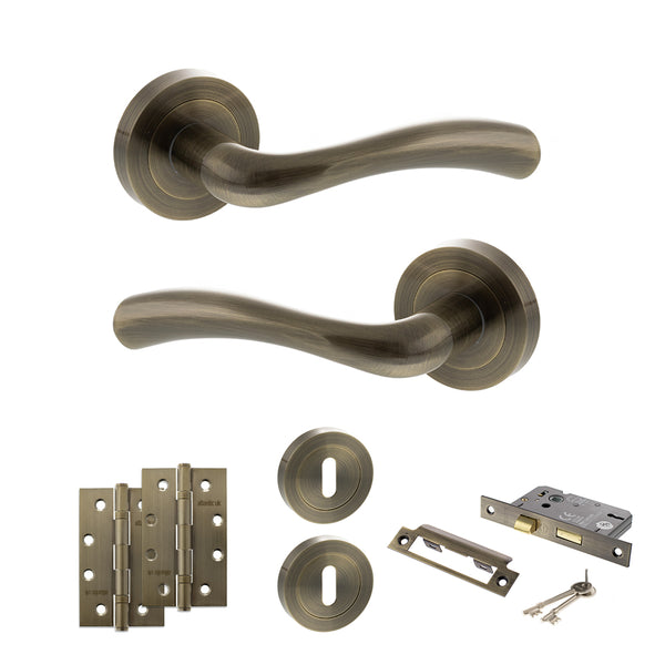 STATUS Texas Door Handle Pack (3 Lever Lock Set - 2.5" CE Sashlock, 4" Slim Knuckle Hinges x2) - Antique Brass - ADPS35RAB18 - Choice Handles