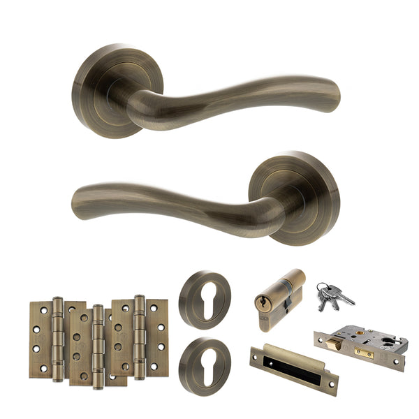 STATUS Texas Door Handle Pack (Euro Lock Set - 3" CE Sashlock, 4" Fire Rated Hinges x3) - Antique Brass - ADPS35RAB23 - Choice Handles