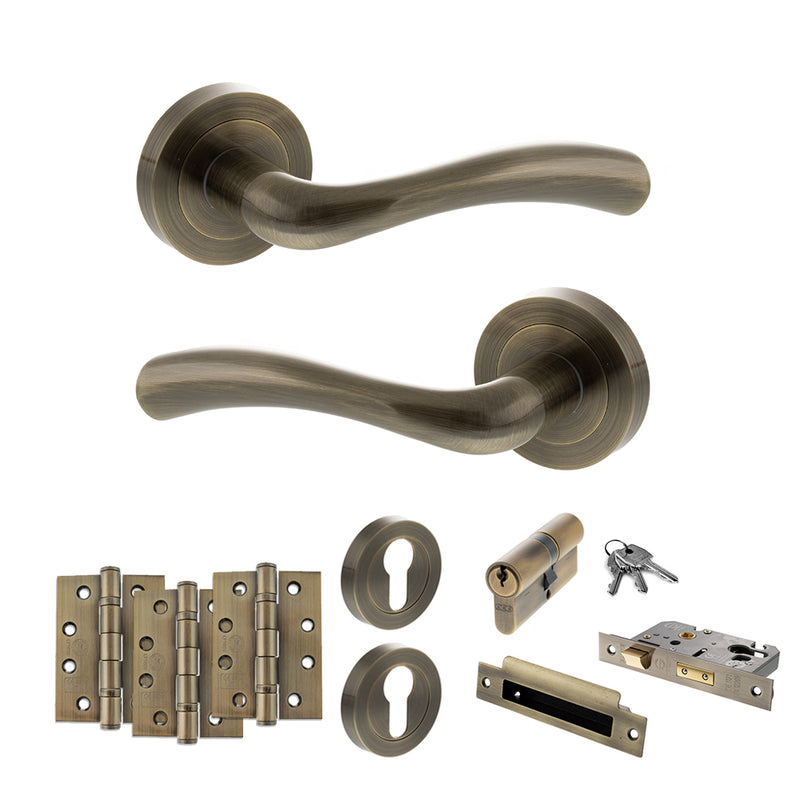 STATUS Texas Door Handle Pack (Euro Lock Set - 3" CE Sashlock, 4" Fire Rated Hinges x3) - Antique Brass - ADPS35RAB23 - Choice Handles