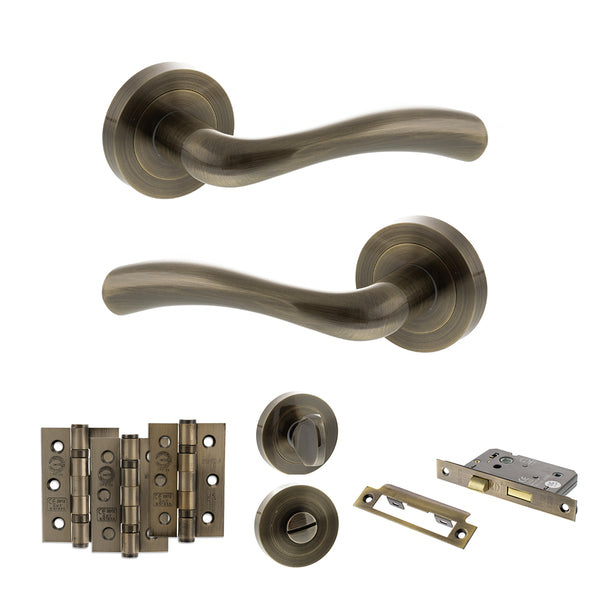 STATUS Texas Door Handle Pack (Bathroom Set - 3" CE Bathroom Lock, 3" Fire Rated Hinges x3) - Antique Brass - ADPS35RAB9 - Choice Handles