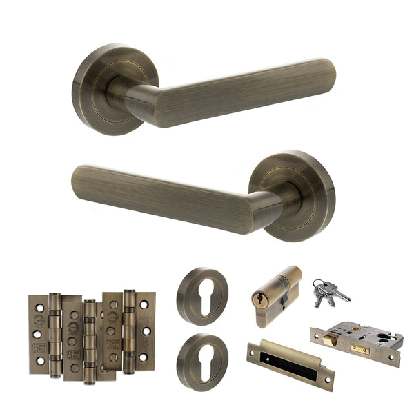 STATUS Carolina Door Handle Pack (Euro Lock Set - 2.5" CE Sashlock, 3" Fire Rated Hinges x3) - Antique Brass - ADPS42RAB20 - Choice Handles