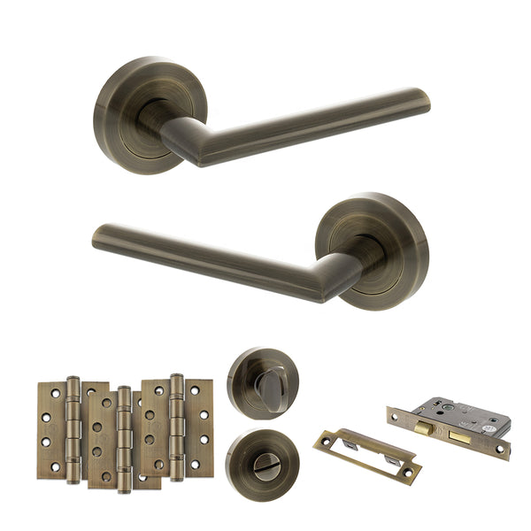 STATUS Alabama Door Handle Pack (Bathroom Set - 2.5" CE Bathroom Lock, 4" Fire Rated Hinges x3) - Antique Brass - ADPS43RAB10 - Choice Handles