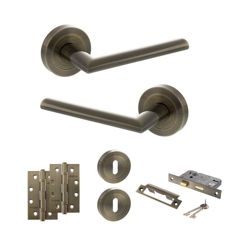 STATUS Alabama Door Handle Pack (3 Lever Lock Set - 2.5" CE Sashlock, 4" Slim Knuckle Hinges x2) - Antique Brass - ADPS43RAB18 - Choice Handles