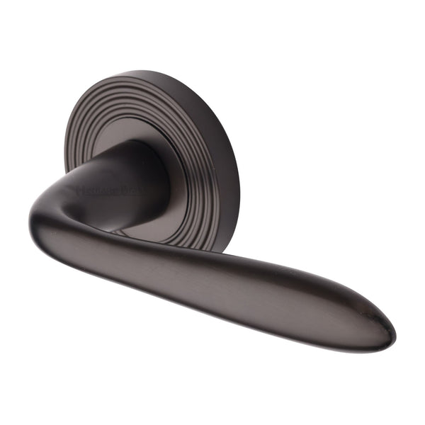 Heritage Brass Door Handle Lever Latch on Round Rose Sutton Reeded Design Matt Bronze finish
UK Registered Design Number 6204750 - RR1752-MB - Choice Handles