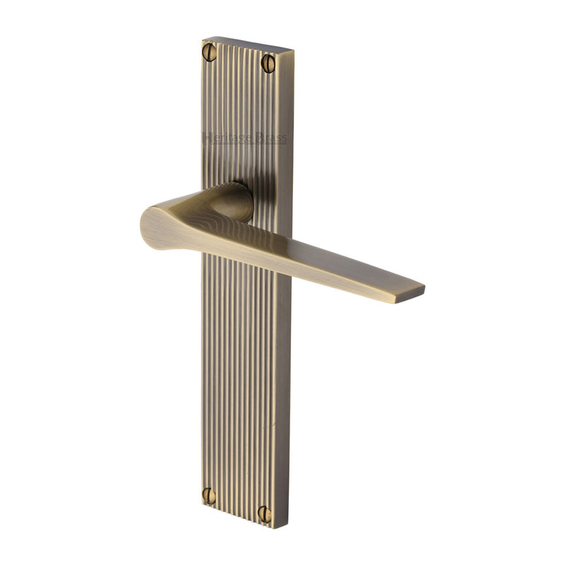 Heritage Brass Gio Reeded Lever Latch Antique Brass finishUK Design Registration Number 6234527 - RR4710-AT - Choice Handles