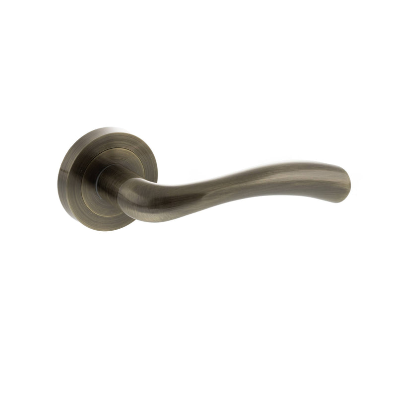 STATUS Texas Lever Door Handle on Round Rose - Antique Brass - S35RAB - Choice Handles