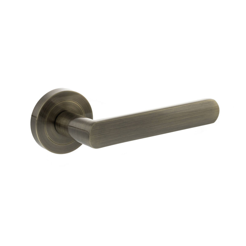 STATUS Carolina Lever Door Handle on Round Rose - Antique Brass - S42RAB - Choice Handles