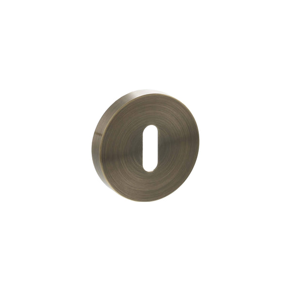 Senza Pari Key Escutcheons on Minimal Round Rose - Antique Brass - SPRESCKAB - Choice Handles