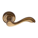 Heritage Brass Door Handle Lever Latch on Round Rose Lisboa Design Antique finish - V1601-AT - Choice Handles