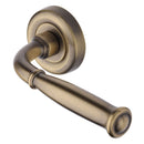 Heritage Brass Door Handle Lever Latch on Round Rose Lincoln Design Antique Brass finish
UK Registered Design Number 6228268 - V1938-AT - Choice Handles