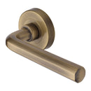 Heritage Brass Door Handle Lever Latch on Round Rose Octave Design Antique Brass finish
UK Registered Design Number 6228267 - V4545-AT - Choice Handles