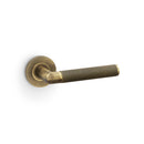 Alexander and Wilks - Harrier Knurled Lever on Round Rose - Antique Brass - AW210AB - Choice Handles