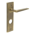 Burlington - Mayfair Door Handle On Din Bathroom Backplate - Antique Brass - BUR10KIT13 - Choice Handles