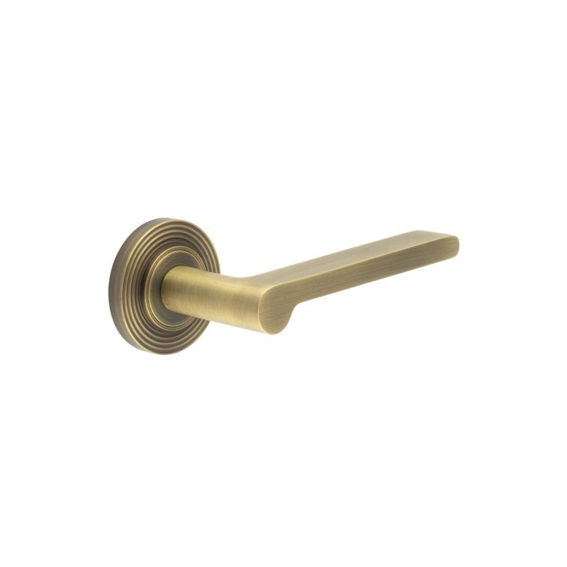 Burlington - Fitzrovia Door Handles On Reeded Rose  - Antique Brass - BUR15KIT4 - Choice Handles