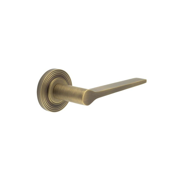 Burlington - Knightsbridge Door Handle on Reeded Rose  - Antique Brass - BUR20KIT4 - Choice Handles