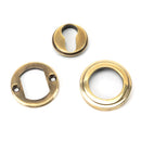 From The Anvil - Round Euro Escutcheon (Art Deco) - Aged Brass - 45708 - Choice Handles