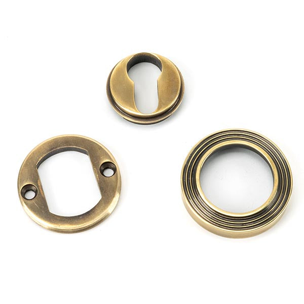 From The Anvil - Round Euro Escutcheon (Beehive) - Aged Brass - 45709 - Choice Handles