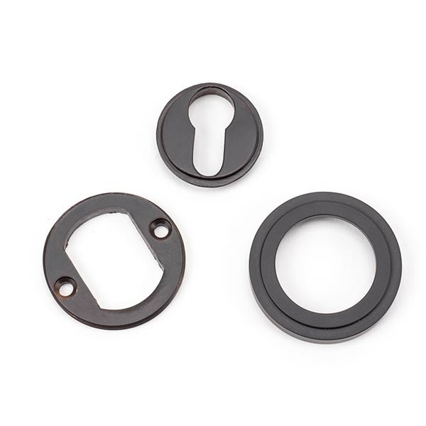 From The Anvil - Round Euro Escutcheon (Art Deco) - Aged Bronze - 46122 - Choice Handles