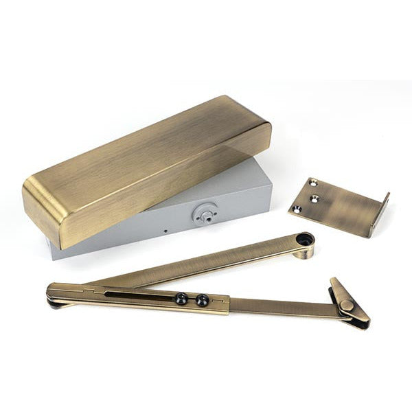 From The Anvil - Size 2-5 Door Closer & Cover - Aged Brass - 50107 - Choice Handles
