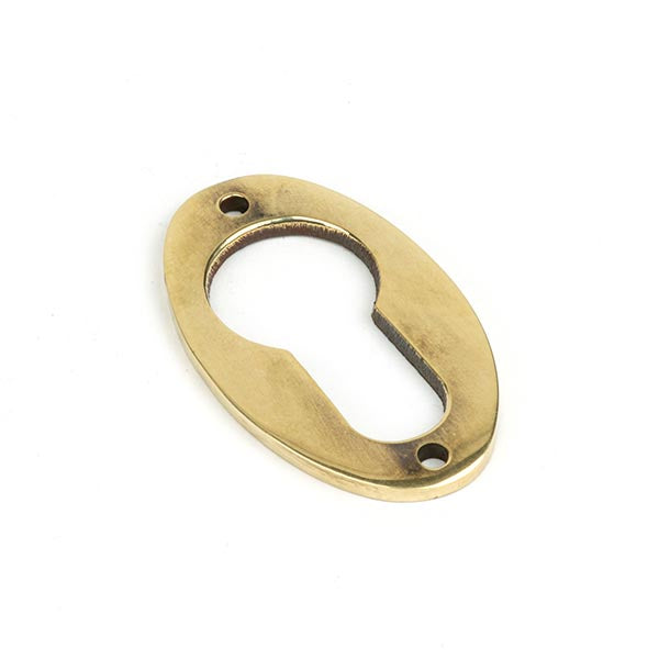 From The Anvil - Oval Euro Escutcheon - Aged Brass - 83819 - Choice Handles