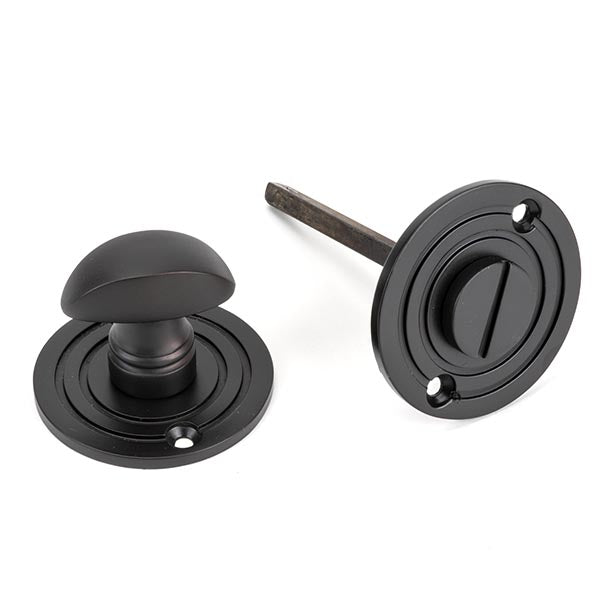 From The Anvil - Round Bathroom Thumbturn - Aged Bronze - 83958 - Choice Handles