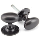 From The Anvil - Oval Mortice/Rim Knob Set - Aged Bronze - 91976 - Choice Handles