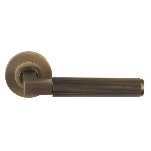 Alexander and Wilks - Hurricane Reeded Lever on Round Rose - Antique Brass - AW202AB - Choice Handles