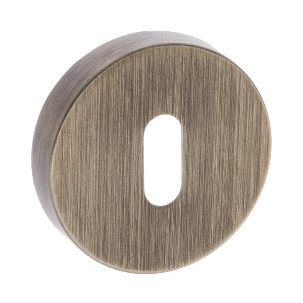 Atlantic Forme Key Escutcheon on Minimal Round Rose - Yester Bronze - FMRKYB - Choice Handles